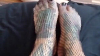 Blonde tattooed lady and her foot slave