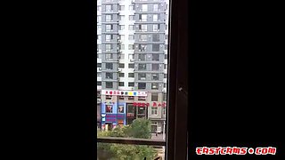 Asian Girl Shared at Open Window