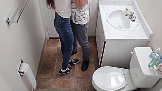 Skinny brunette gets fucked from behind in standing pose – toilet quickie
