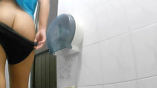 Athletic Girl Pissing in Public Bathroom