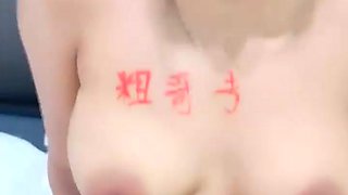 Hot babe with perfect big boobs taking shower