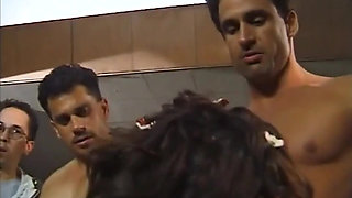 Brunette babe in an extreme gangbang with 6 men