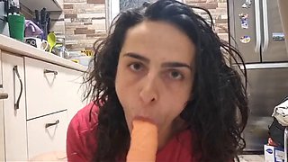 Sucking and fucking my big dildo