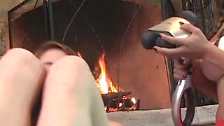 Sexy and horny in front of the fireplace massaging each other
