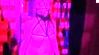 Dom Gresopio in Shibari Corset with Clothing and Mask