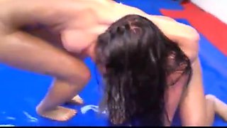 Oiled girls topless wrestling
