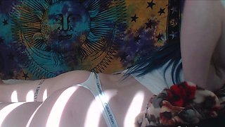 Small titted brunette Sharron with glasses masturbates