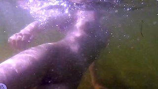 Amateur redhead shows off sexy body in nude poses outdoors