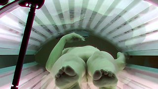 Horny Czech woman caught masturbating at the tanning salon