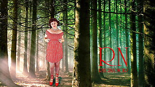 Pin-up lady posing in the forest. She shows her tits and pussy. Mesh tights. Special effect.