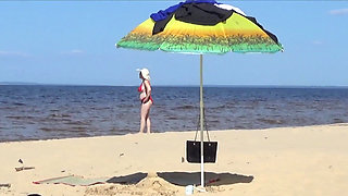 Funny Stepmommy Has Fun on the Beach with Young Guys