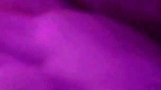 Young Girl Using Her Feet to Play with the Dildo While Masturbating