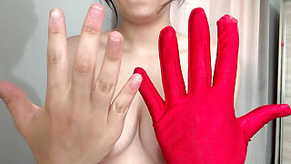 I am getting excited in colorful gloves and masturbating a monster cock