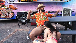 Tattooed slut is fucked by a BBC next to the food truck