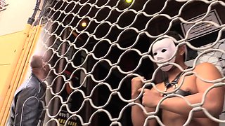 Experienced ass faces a black fist in a fisting scene. - Black Fist