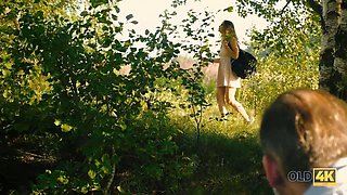 Alexis Fox seduces an old man with her busty body and gets caught jerking off in the greenery