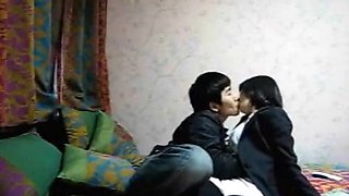 Chinese couple bedroom blowjob