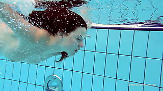 Tight brunette Russian babe Katy Soroka swims