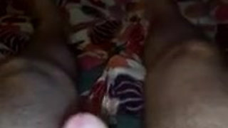 Closeup of John getting himself a hardon