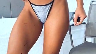 Lusty Asian babe in black lingerie drinks jizz from a cup