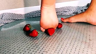 Amateur femdom mistress crushing strawberries barefoot
