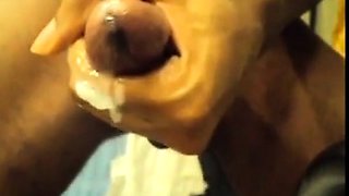Black guy jacks off his big cock and cums hard