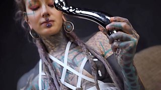 Anuskatzz grabs her cold, stainless steel toy and slides it deep into her tight ass