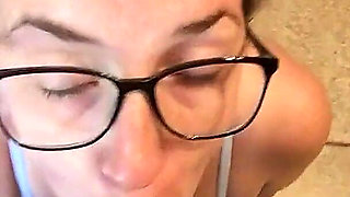 New Apartment Fun: Glasses-wearing MILF's Cock Sucking and Cumshot
