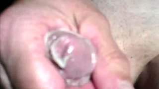 Twink's Webcam Handjob: Small Cock, Big Condom Fun