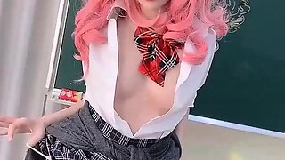 Naughty schoolgirl performs sensual striptease in class