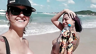 She Sucks My Cock in Public on the Beach