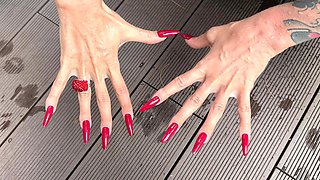 Long Red Nails and Long Fingers in Swimming Pool
