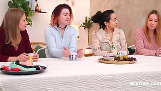 Four adorable teens play with each other's pussies on camera