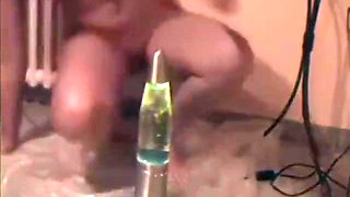 Girl fucks a lava lamp and then pees on it - insertion