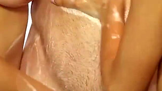 Two stunning masseuses are pleasuring lucky guy's hard cock