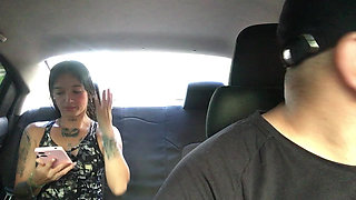 Latina girl encourages Uber driver to have sex on her way to work.