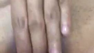 Filipina girl rubbing shaved pussy