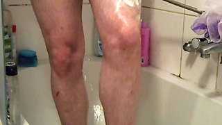 Young man in the shower