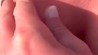Boobs and Pierced Nipples Playing on the Beach