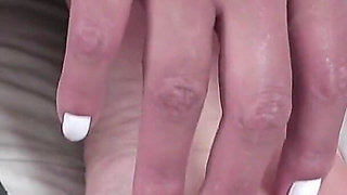 Sexy Brunette in Amazing Footjob!