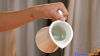 Foxii Black and Claudia Bavel get oiled up and pleasured in a steamy massage video