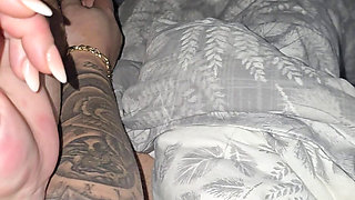 Tattooed step mom hand slip into step son dick for a handjob