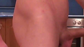 Brunette teen gets fucked in the kitchen