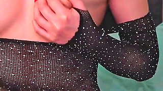 A Beauty with Cute Tits and in Beautiful Lingerie Watches Porn and Caresses Herself