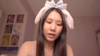 Cute Asian girl Alize Zaide in bunny costume enjoys ASMR vibes