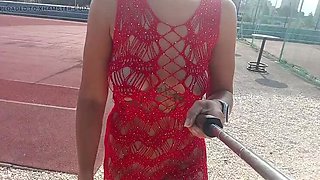 Polish girl flashes huge natural tits and pussy in lace dress outdoor public