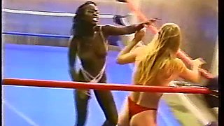 Topless interracial pro style wrestling with body slams