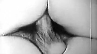Woman with big ass and boobs gives head and does it doggy style in old b&w clip
