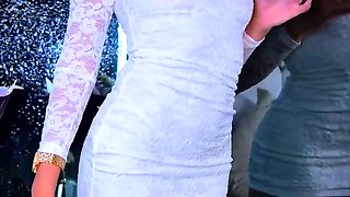 EvelynMills short white dress barely hides her juicy ass on