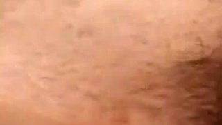Brunette plays with dildo
